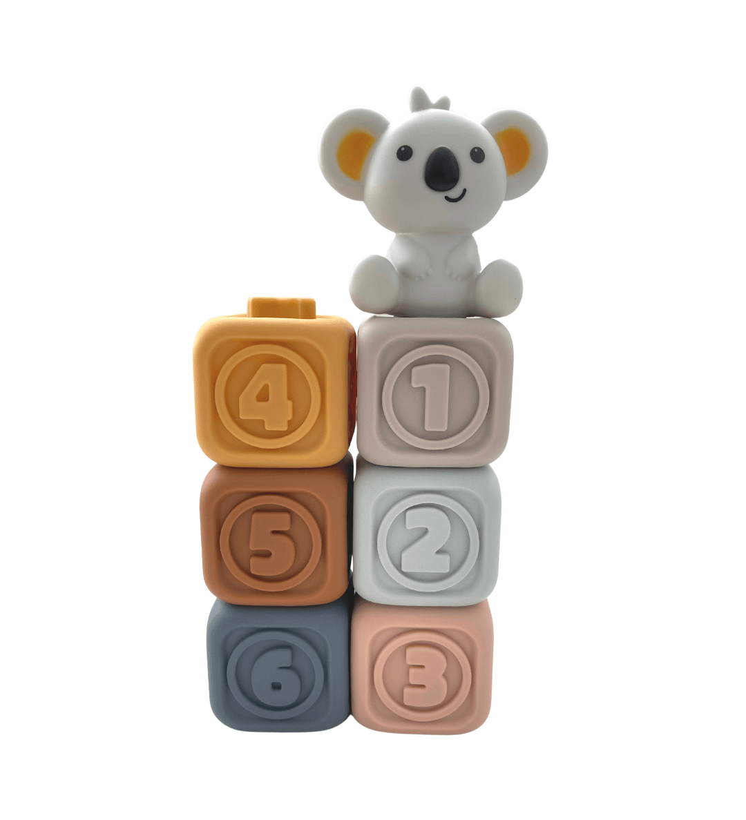 Koko Speelblokken set uitgespreid, toont verscheidenheid aan kleuren en patronen.